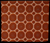 large and small orange circles covered with small brown oval print against basket weave pattern. Original from the Minneapolis Institute of Art.