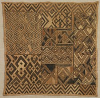 light tan ground; patchwork-like panel with sections with various geometric designs in dark, medium and light browns--primarily diamonds and zigzags; may be a pile panel with severe losses to raised pile; received mounted. Original from the Minneapolis Institute of Art.