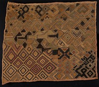 predominantly tan with red, yellow, black, and green accent colors; surface decorated with geometric designs including diamonds and zigzags; constructed of single panel; edges are hemmed. Original from the Minneapolis Institute of Art.