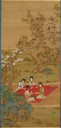 Four ladies seated around a low red table on a red flowered carpet on a stone pathway in a garden, playing a game with cards or tiles; trees with white blossoms behind path at center and in front of path at left; blue rocks, LRC; grey rock, URQ. Original from the Minneapolis Institute of Art.