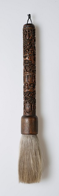 light brown wood brush with deep carvings on handle; round base with hanging cord and loop tied and glued to end; top of brush handle (near bristles) is a cylinder with rounded edges; grey hair bristles; carvings feature a variety of trees, plants, multiple figures and two dwellings. Original from the Minneapolis Institute of Art.