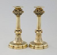 George IV Gothic Revival; six lobes on foot; hexagonal tapered shaft; round rim; bulb above foot has alternating three-dimensional leaves and tiny frogs; three-dimensional collar below candle cup with repeating leaf designs. Original from the Minneapolis Institute of Art.