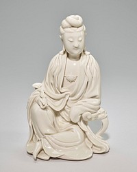 seated male figure with PR knee drawn up; head turned slightly toward PL; figure has slightly heavy face and elongated earlobes; long hair styled in loops on top of head with two tendrils behind ears; figure wears a loose long robe open at the chest and wears a pendant with a floral design; man holds scepter in his PR hand and rests his PL elbow on a stand decorated with scrolls and a bulldog-like face; white. Original from the Minneapolis Institute of Art.