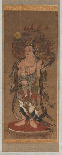 Standing male figure with stringy moustache, and long flowing black hair; lotus blossoms and flames around halo; draping colorful skirts; bare chested with draping sashes. Original from the Minneapolis Institute of Art.