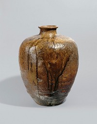 large, rust-colored jar with dripping brown and tan over glaze; narrow base widening to top with graceful, short neck and rolling lip. Original from the Minneapolis Institute of Art.