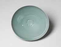 Bowl with shallow, thinly incised birds flying inside with long, trailing feathers; very narrow base and wide mouth; celadon glaze. Original from the Minneapolis Institute of Art.