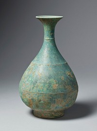 bronze bottle with swelling body, narrow neck, flared mouth; three shallow ribs encircling bottle over body, shoulder, and neck; incised line inside mouth; short foot; green from patina. Original from the Minneapolis Institute of Art.