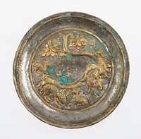 small silver dish with raised gold colored decoration of grazing deer, mountains, and bent tree with a monkey; gold band separating scene from wall; lip is decorated with zigzag and spot incised lines. Original from the Minneapolis Institute of Art.