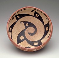 bowl with rounded bottom; red on exterior; interior decorated with a black spiraling figure with geometric designs on a white ground. Original from the Minneapolis Institute of Art.