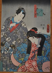 Couple with man at left and woman at right, biting the red and white sleeve of her inner kimono. Original from the Minneapolis Institute of Art.