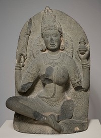 A yogini bearing a jar. One of 19 known sculptures from a set originating in Kanchipuram, Tamil Nadu, India.. Original from the Minneapolis Institute of Art.