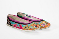 shoes with turquoise ground, black, fuschia and orange section has multicolored embroidery; shoe openings have green and fuschia embroidered trim. Original from the Minneapolis Institute of Art.