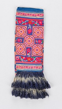 long rectangular fabric with heavy white/blue striped tassels on both ends; embroidery on opposite side and end with design of for squares around another; design done in white, pink, purple, orange and blue. Original from the Minneapolis Institute of Art.