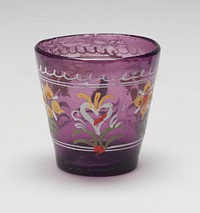 small beaker, purple glass painted in enamel with a red bird, a white heart and two floral sprays. Original from the Minneapolis Institute of Art.