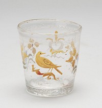 small beaker, clear glass painted in enamel with yellow bird on a branch, a white heart and two floral sprays; Holiday Traditions, Providence Room. Original from the Minneapolis Institute of Art.