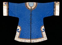 blue with embroidered multicolored bands at cuffs and bottom, also machine embroidered bands, five metal buttons. Original from the Minneapolis Institute of Art.