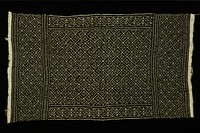 mudcloth skirt; design: Saa ni kili (body of the serpent coiled around her eggs.). Original from the Minneapolis Institute of Art.