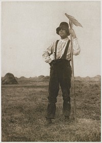 man standing in a field with haystacks in background; man wears a hat, long-sleeved shirt, pants with suspenders and boots, and holds a rake with his PL hand; sheet cut from book. Original from the Minneapolis Institute of Art.