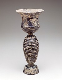 thistle-shaped cup on slender, horizontally ribbed oviform stem pierced with 6 rows of short vertical slits above inverted cup-shaped foot. Original from the Minneapolis Institute of Art.