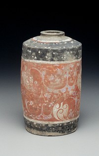 cylindrical jar tapered sharply at top terminating in a rimmed 1-1/8 in. opening; exterior decorated by a large organic motif; central band of red, blue and white; two smaller bands of white and black with pairs of white dots encircle the base and top. Original from the Minneapolis Institute of Art.