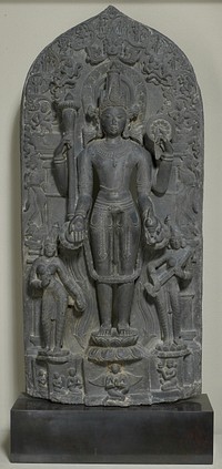 Vishnu on a lotus pedestal flanked by his principal consorts; holds a mace, sun dish (cakra), conch and lotus blossom in his four hands; various animals and mythical creatures in background; figures shown at base.. Original from the Minneapolis Institute of Art.