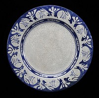 Pottery with blue painted border of alternating rabbits and plants over a white crackled glaze. Printed by Alice and Joseph Findon Smith.. Original from the Minneapolis Institute of Art.