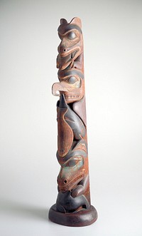 carved in half of hollowed-out log and painted; animals are based on a whale, then bear, fish (flat) in foreground, with whale in background; bird, bear with frog in mouth; remains of pigment in blue/green (malacite), black and red. Original from the Minneapolis Institute of Art.
