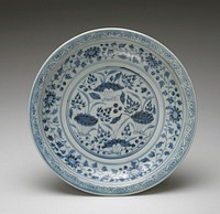 blue and white; rounded sides; aquatic plants at center; bands of floral sprays and scroll at edge; lotus petal with circle and scroll motif around outer edge. Original from the Minneapolis Institute of Art.