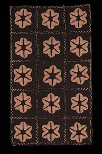 15 brown squares with pink and green tufted floral shapes at center of each; pink stitching between; tan, blue and green brocade backing. Original from the Minneapolis Institute of Art.