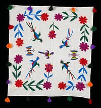 Hand embroidered on white background; multicolored flowers, butterflies and birds; tassles around the four selvedges.. Original from the Minneapolis Institute of Art.