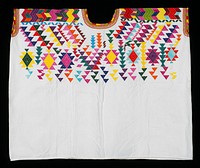 White, two-paneled cotton huipil with multicolored embroidery of abstract geometric patterns in turquoise, yellow, blue, orange, purple and pink.. Original from the Minneapolis Institute of Art.