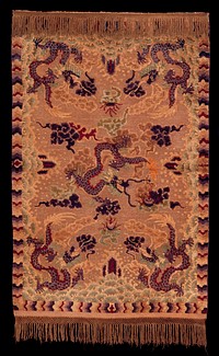 Rug with a bronze colored field achieved by applying braided metallic threads to the base web of cotton. The design of five-clawed dragons, flaming jewels and the Heavenly Sea motif stands out in a relief against this ground. Colors chiefly blue, red, tans and green. All are faded and the reds have run slightly. Sides overcast, ends finished with a narrow web terminating in a gold fringe recently applied. Across the lower web a series of chinese characters woven in gold threads. Cotton warp and woof. Senna knot, 12 to the lineal inch.. Original from the Minneapolis Institute of Art.