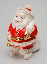 standing Santa Claus figure with gold belt, gold button and gold bell in PR hand; very large, lumpy white sack over PL shoulder; small extruded ceramic tubes at cuffs, hems of coat and pants, hat tassel and bottom edge of hat. Original from the Minneapolis Institute of Art.