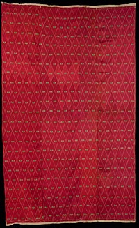 cream fabric ground with overall red embroidery in diamond pattern with pairs of green arrowhead-like shapes. Original from the Minneapolis Institute of Art.