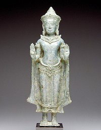 standing Buddha wearing cape; both hands raised in abaya mudra; wearing caplike crown, earrings and necklace; attached to mount. Original from the Minneapolis Institute of Art.