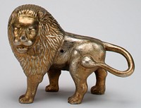brass plated standing lion with head turned all the way to the left; tail wrapped around to attach at PL side; coin slot atop head; screw replaced by wrong size machine screw; 2 halves attached at side. Original from the Minneapolis Institute of Art.