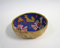 bowl made from lower portion of a gourd; interior beaded with two birds, two quadrupeds, butterfly and geometric designs in multicolored beads on blue beaded ground. Original from the Minneapolis Institute of Art.