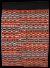 luntaya style, black waist band; black and white woven patterns on dull orange. Original from the Minneapolis Institute of Art.