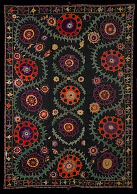 Warp-twined edge (LM) with cross-stitch embroidery. Ikat band on reverse edge. Multi-color silk embroidery on cotton black ground. Floral, vines, medallions, three vertical panels. Hanging cord in upper left corner. Panels joined after embroidered. Attached woven braid all four sides, joined at center top and bottom and may created a fringe at center. Ikat edging on three sides of reverse. No lining.. Original from the Minneapolis Institute of Art.