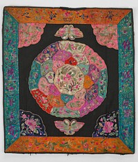 black cotton center square has three elaborate rows of embroidered petals forming large flower with white center with bird embroidery; petals are pinks, greens, reds and dark blue; triangle corners in blue and pink silk appliques are similarly embroidered; butterfly appliques at top and bottom; borders of aqua and orange embroidered with Chinese symbols, flora and fauna; metal studs throughout; commercial printed lining; cotton with three snaps on bottom. Original from the Minneapolis Institute of Art.