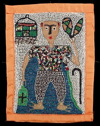 beaded and sequined panel with orange trim and backing; standing figure wearing a short-sleeved multicolored shirt and black and white pants; cane and snake, LRC; birdcage (?), ULC; bottle (?), LLC. Original from the Minneapolis Institute of Art.