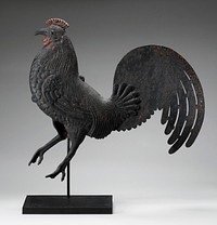realistic walking rooster with PR foot raised; flat tail; black patina with red comb and wattle; feathers delineated overall on body. Original from the Minneapolis Institute of Art.