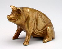 seated smiling brass pig; PR hip inside a raised circle is letter "V". Original from the Minneapolis Institute of Art.