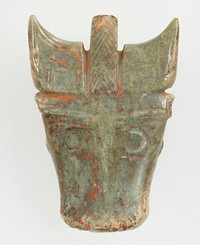 Mask of animal with horns can be identified as bull; simple incision to indicate the detail of the animal on the front only. Grey green jade; traces of red pigment and calcification. Original from the Minneapolis Institute of Art.