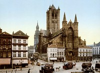 View of Saint Nicholas' Church and Klein Turkije, Korenmarkt, Ghent, Belgium. This image shows the state of the church before the houses alongside the church were demolished. In the background: the belfry with the cast iron campanile which replaced the medieval wooden spire in 1851 (and which was itself replaced by a stone bell tower in 1913).