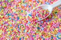 Ice-cream sprinkles background, colorful dessert