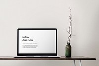 Laptop screen mockup psd on a desk minimal home office zone design