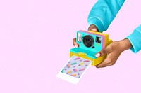 Hands holding instant photo camera, retro modern design