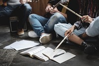 Bandmates rehearsing for their gig