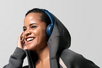 Sporty woman listening to music